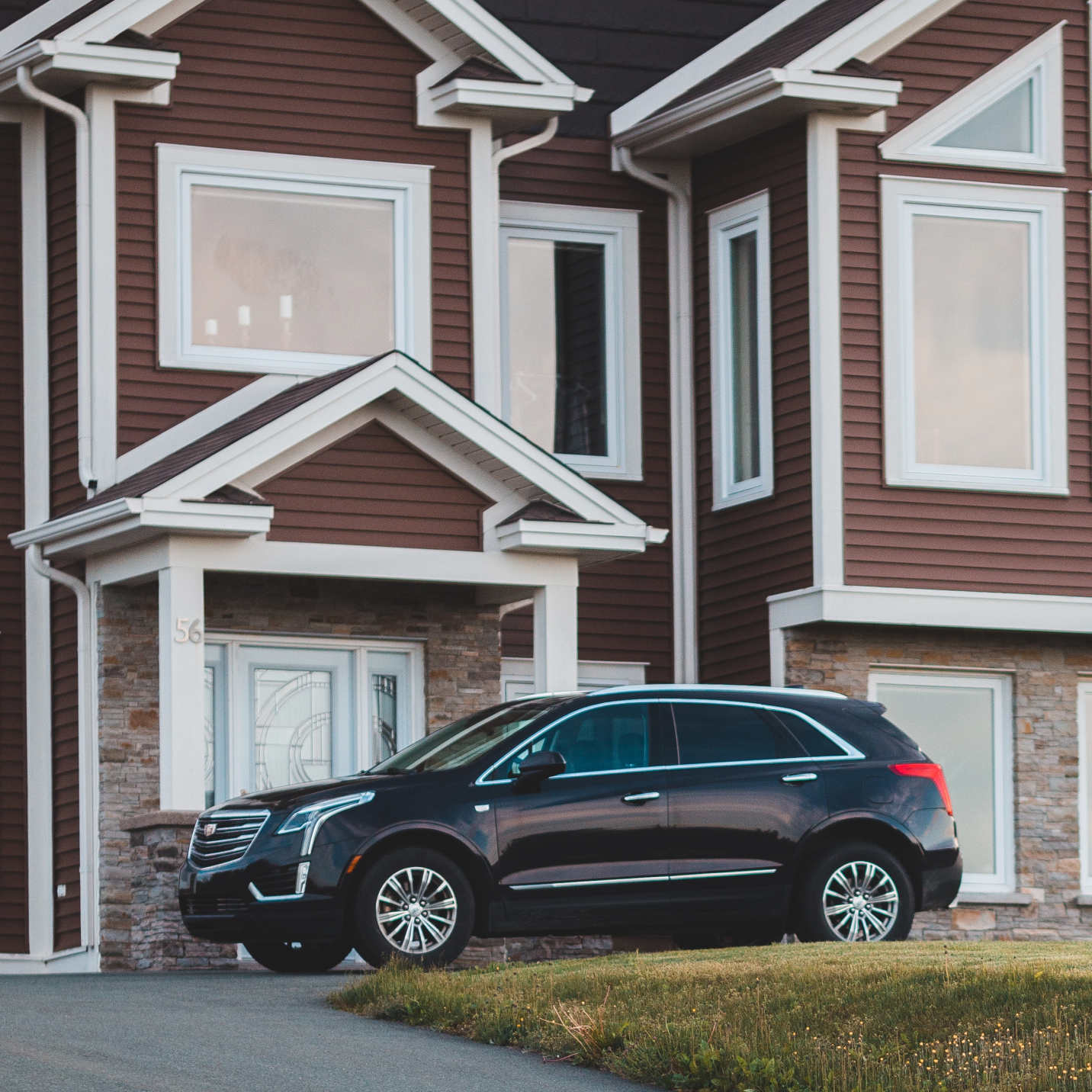 car in front of the house